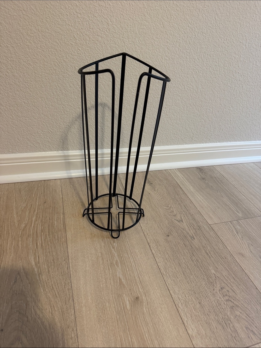 Black metal toilet paper holder